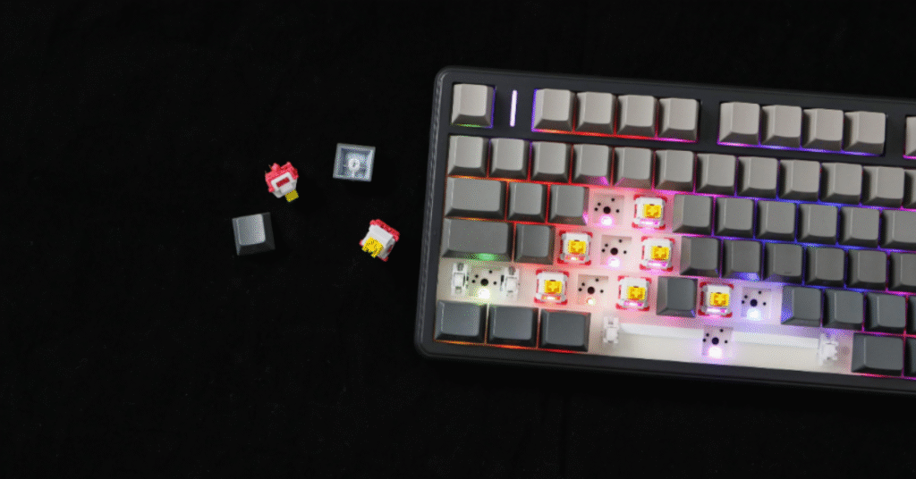 Close-up of AULA F99 Pro keyboard showing customizable keys and RGB lights